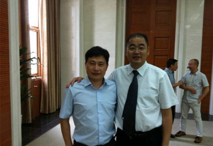 与圣元西南分公司总经理陈茂福合影